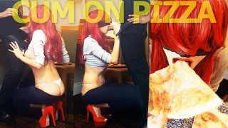Stunning redhead in orange high heel wants some cum on her pizza!!!